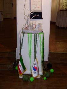 نماد پیام نمایشگاه-آرزوی زمینی سبز برای همه آفریده ها-with green earth for all people